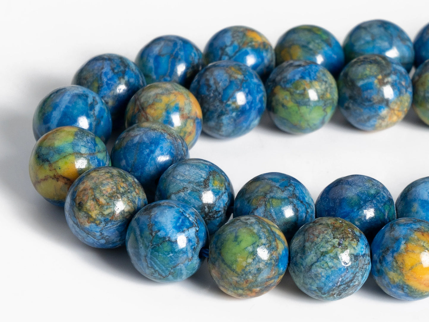 Fil de perles de magnésite bleu paon HQ