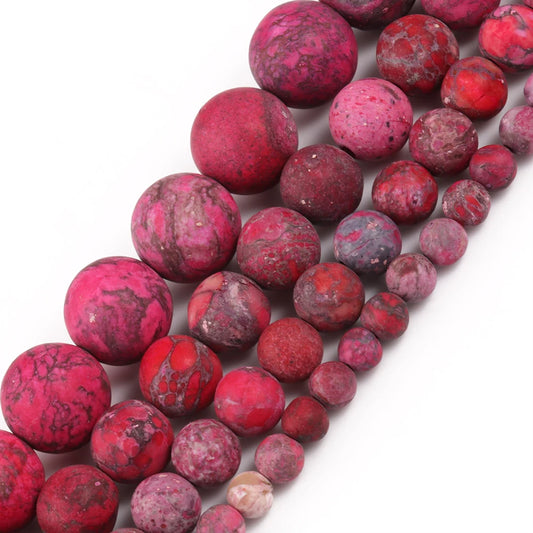 Fil de perles en howlite fuchsia mat teinté