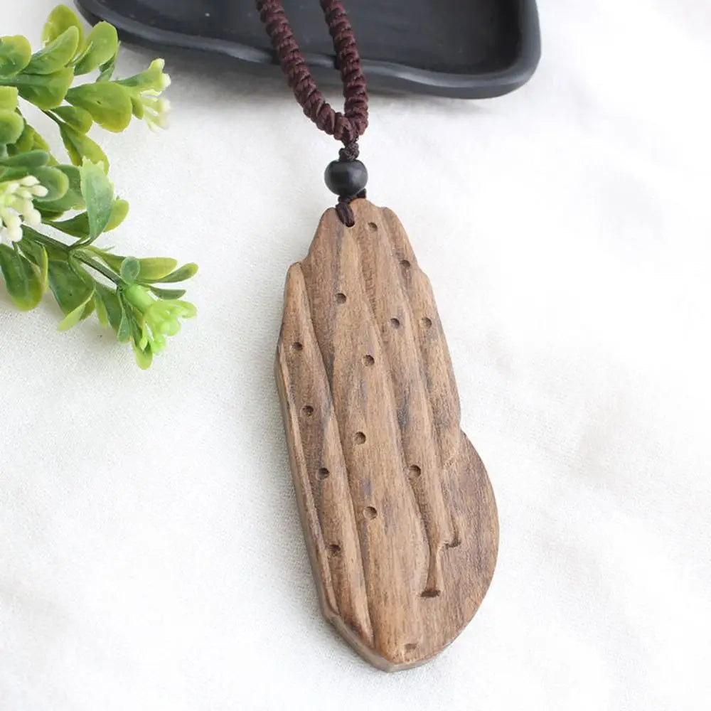 Collier pendentif en bois de santal