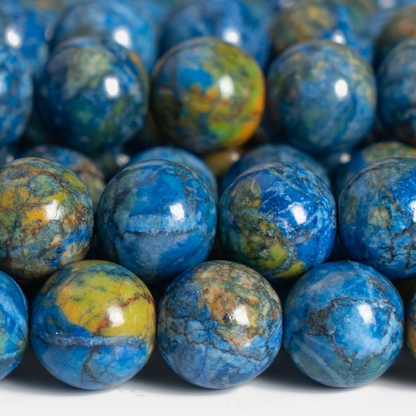 Fil de perles de magnésite bleu paon HQ
