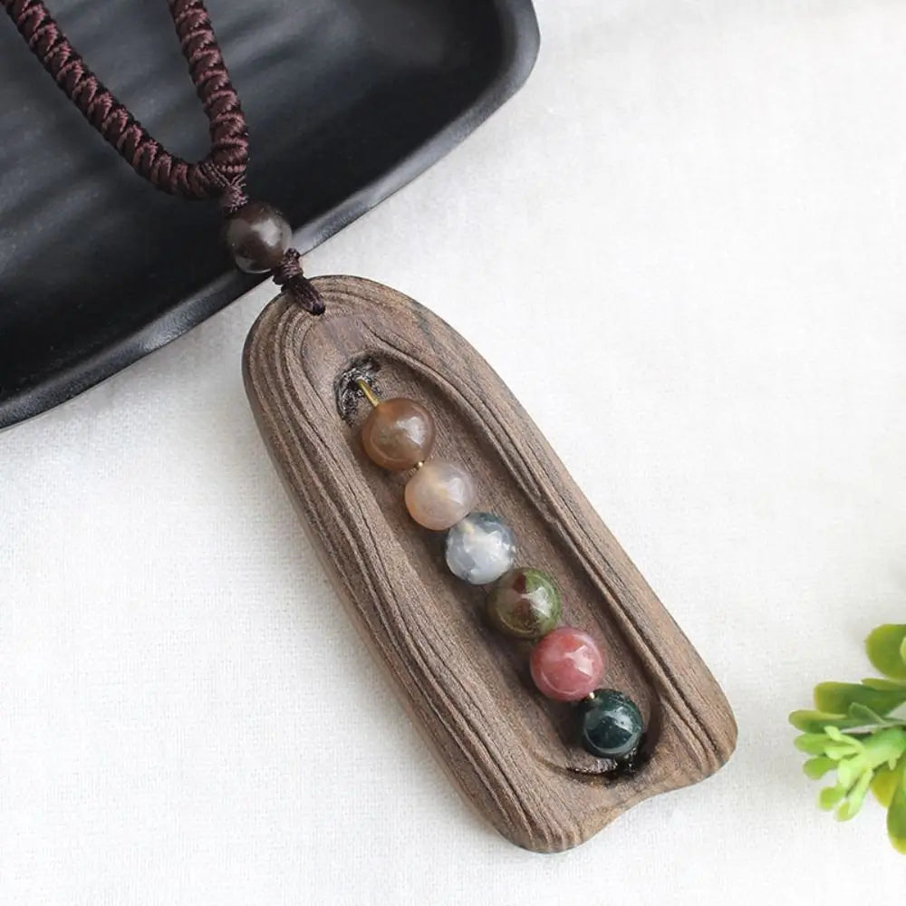 Collier pendentif en bois de santal