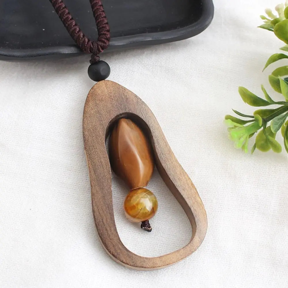 Collier pendentif en bois de santal